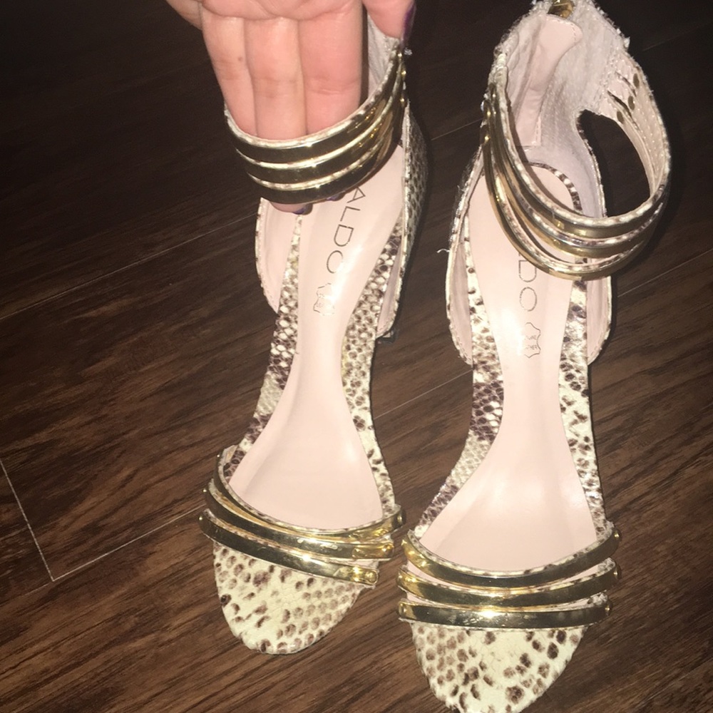 Snakeskin and gold heels